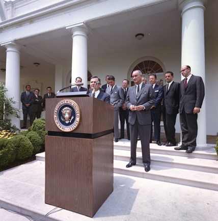 In the presence of the US President Johnson, David Rockefeller Launches IESC in White House Rose Garden in 1964.  The International Executive Service Corps (IESC) was established to help bring about prosperity and stability in developing nations through the growth of private enterprise.